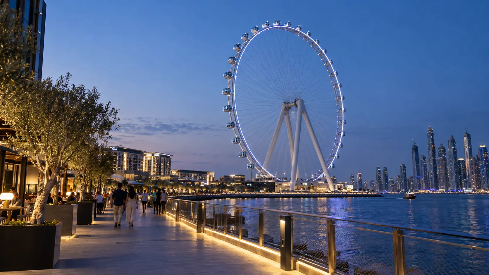 Ain Dubai illuminated above the Bluewaters promenade